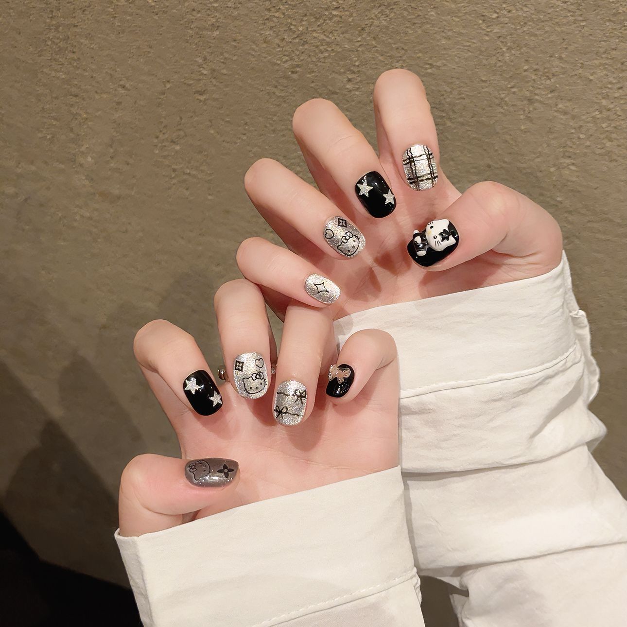 Gothic Black Hello Kitty Nail Art
