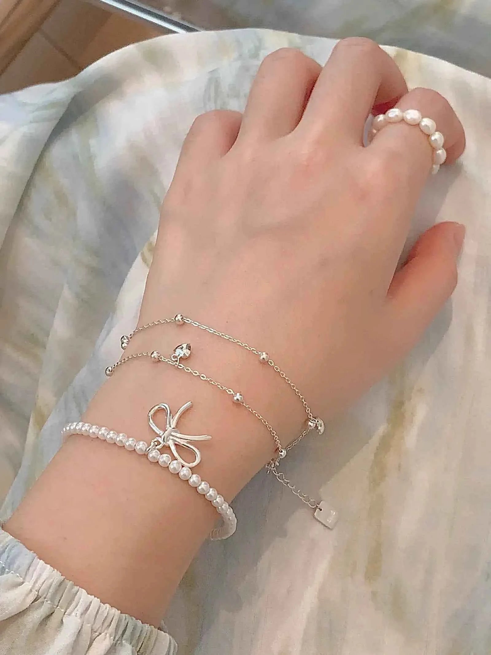 "Alice's Bowknot Pearl" 925 Sterling Silver Bracelet - Delicate, Elegant, and Charming