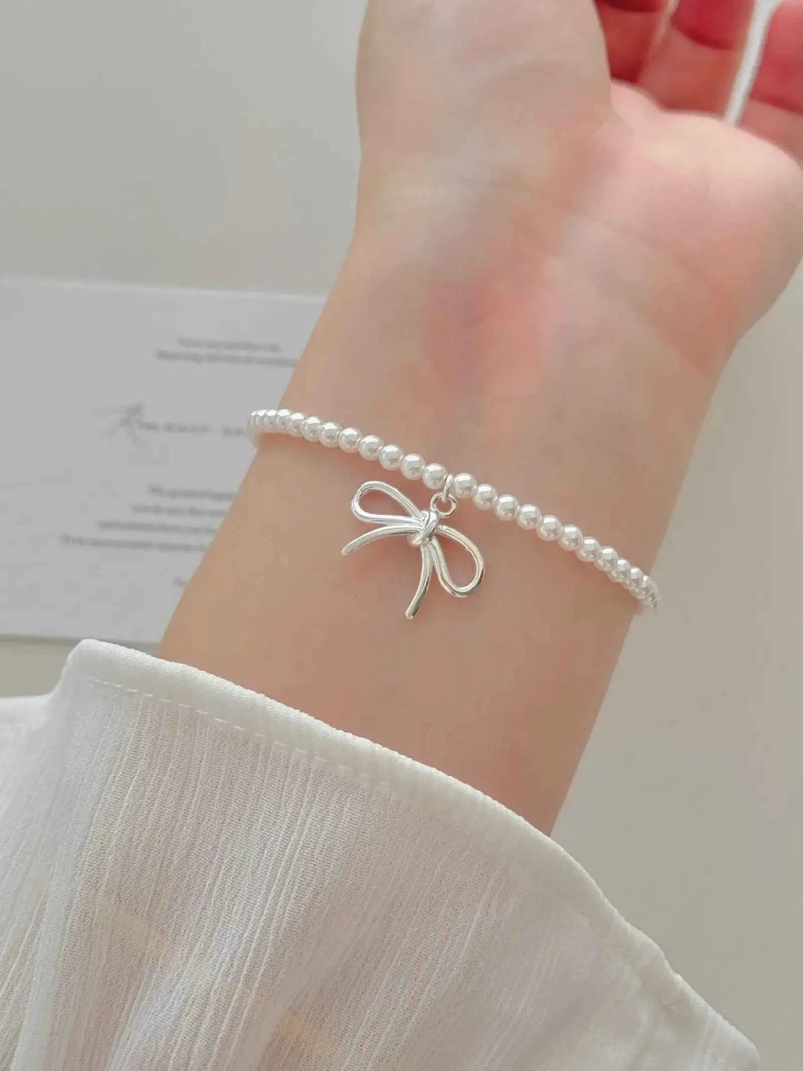 "Alice's Bowknot Pearl" 925 Sterling Silver Bracelet - Delicate, Elegant, and Charming