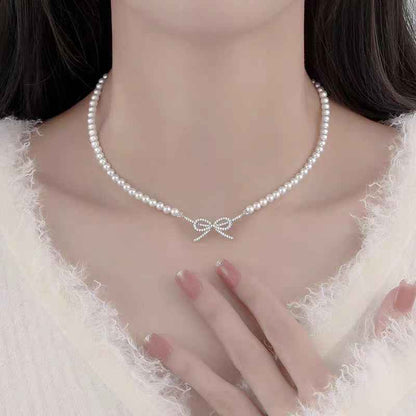 "Charming Pearl & Gold-Plated Bow" Necklace - Delicate, Sweet, and Versatile