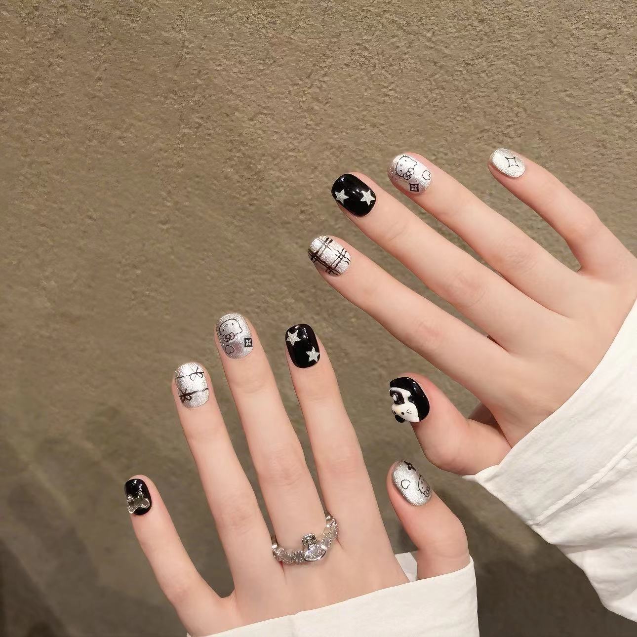 Gothic Black Hello Kitty Nail Art
